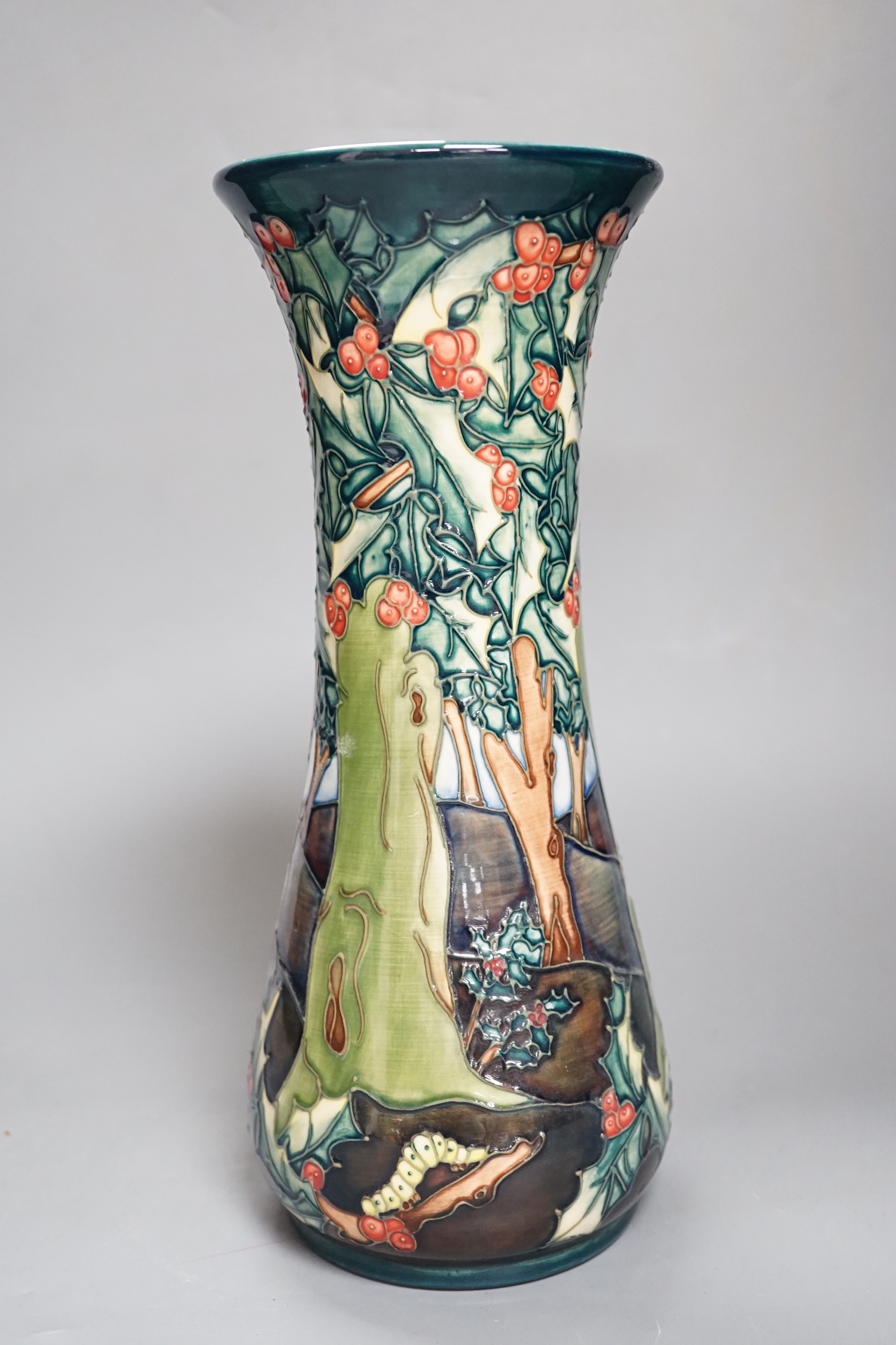 A Moorcroft vase with woodland scene - 30cm high